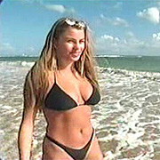 Busty Latina Celeb At Beach In Black Bikini