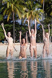 Four Erotic Beach Nudes Splashing In Water